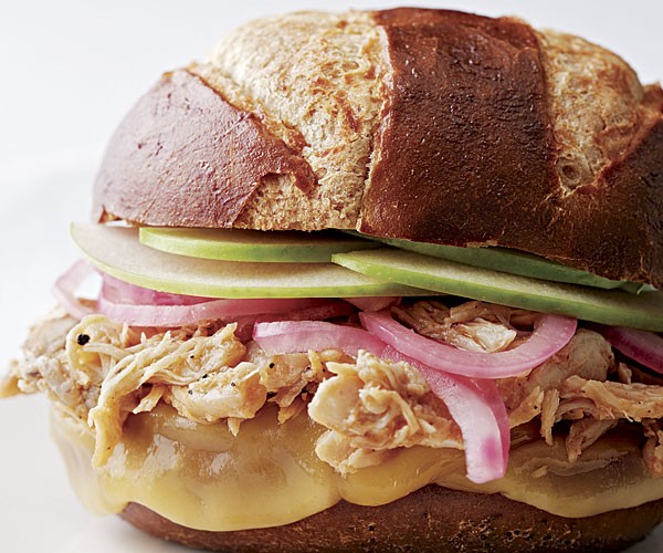 Tangy pulled chicken sandwiches with pickled onions, apple, and smoked cheese