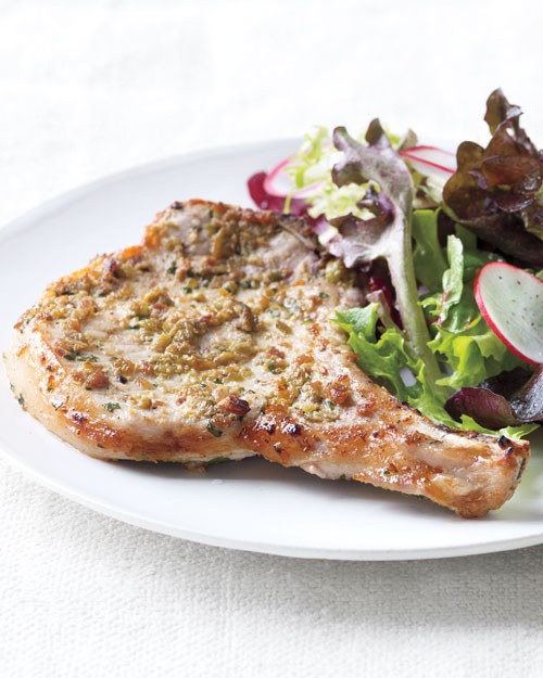 Tapenade pork chops with green salad