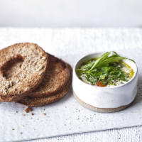 Tarragon baked eggs with crisp bagel toasts
