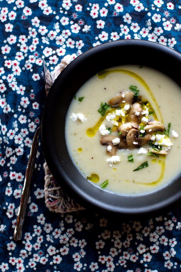 Tarragon-flavored potato and parsnip soup with mushrooms and goat cheese