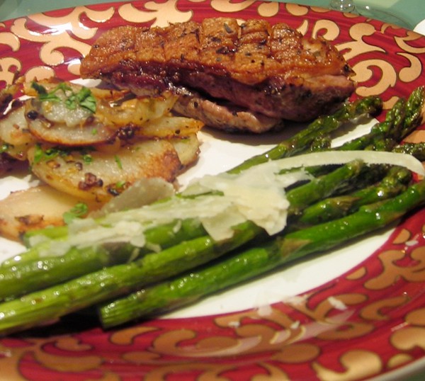 Tarragon seared duck breast; potatoes sauteed in duck fat; roasted asparagus with shaved pecorino & baby chocolate souffle