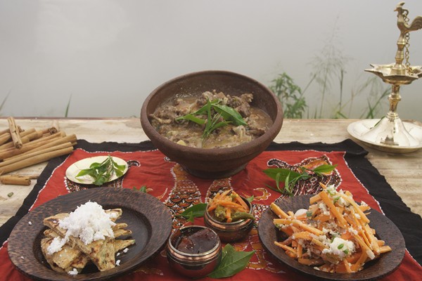 Tea country pork curry with coconut roti
