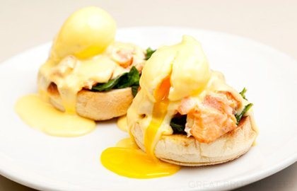 Tea-smoked Alaska salmon, poached eggs, spinach and yuzu Hollandaise, English muffin