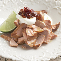 Tea-smoked wild Alaskan salmon with crème fraîche and chilli jam