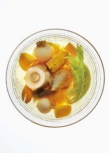 Tender osso buco, bone marrow, and vegetables in beef broth (Nilaga)
