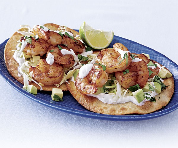 Tequila-chipotle shrimp tostadas with lime and sour cream
