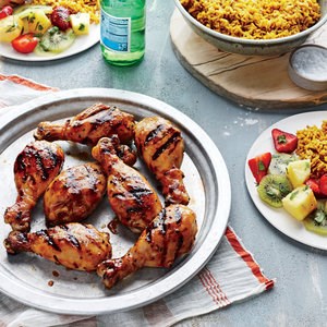 Teriyaki chicken drumsticks with tropical fruit salad