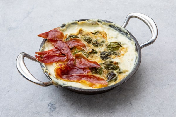 Tetilla cheese-stuffed Padrón pepper gratin 