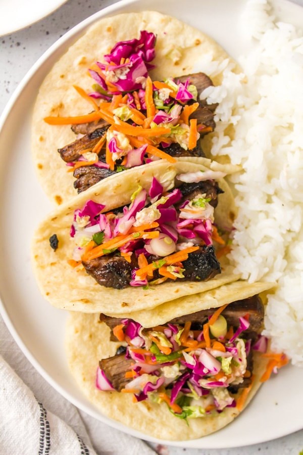 Thai beef tacos with lime cilantro slaw