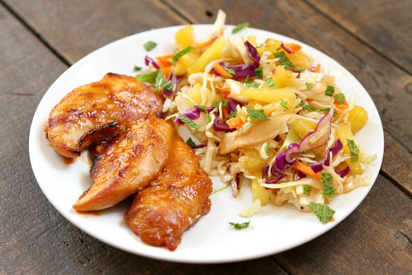Thai chicken tenders with broiled pineapple slaw