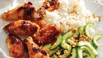 Thai chicken wings with cucumber-peanut salad and rice