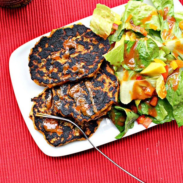 Thai curried zucchini fritters with a spicy peanut sauce