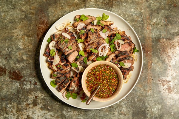 Thai grilled pork (Moo ping) with chili-lime dipping sauce (Nam jim jaew)