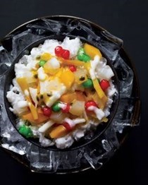 Thai jewels and fruits on crushed coconut ice