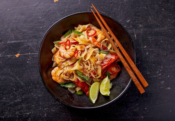Thai stir-fried rice noodles with shrimp and basil