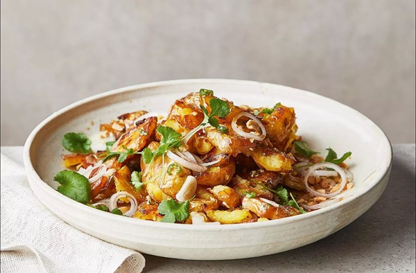 Thai-style smashed potatoes with chilli dressing