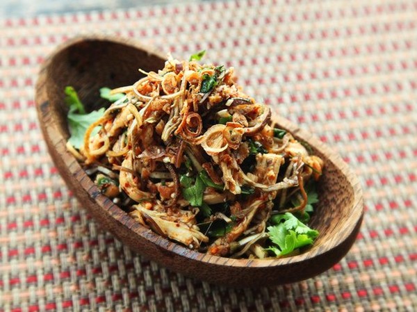 Thai-style spicy chicken, banana blossom, and herb salad (with lots of fried things)