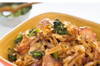 Thai-style stir-fried noodles with chicken and broccolini (Pad see ew)