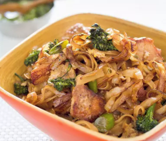 Thai-style stir-fried noodles with chicken and broccolini (Pad see ew)