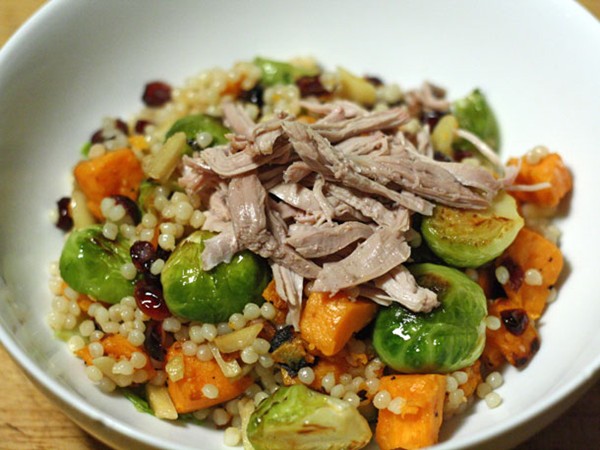Thanksgiving leftovers salad with sweet potatoes and Brussels sprouts