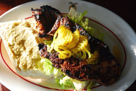 The Rev. EJ's pork steak po'boy