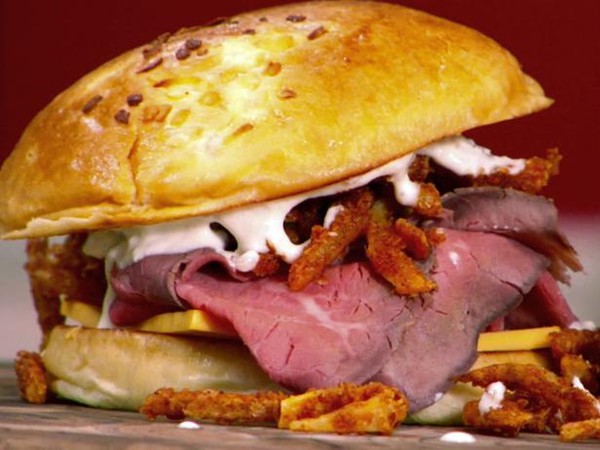 The roast beast master with crispy onions and creamy horseradish sauce