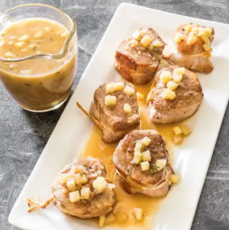 Thick-cut pork tenderloin medallions with apple cider sauce