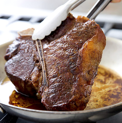 Thick-cut porterhouse steaks