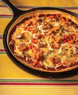Thin-crusted Mexican pizza with queso oaxaca and chorizo