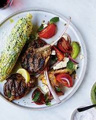 Thin grilled lamb chops with lemon