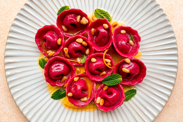 Three-cheese beet cappelletti with Meyer lemon & mint