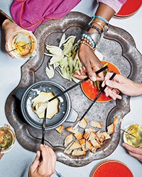 Three-cheese fondue with pickles