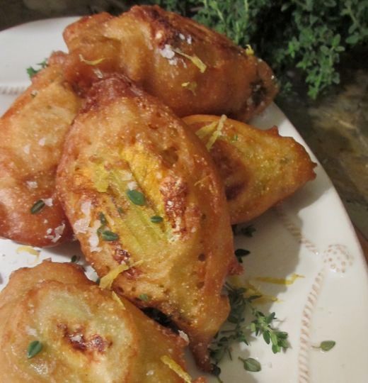 Three cheese-stuffed squash blossoms