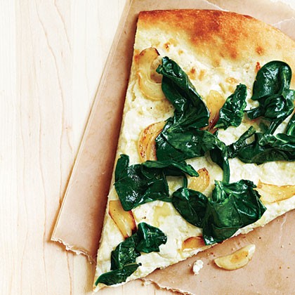 Three-cheese white pizza with spinach