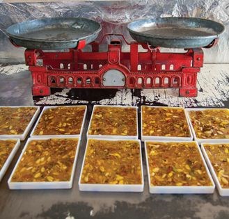Three-nut starch halva (Halva-ye masqati-e Lari)