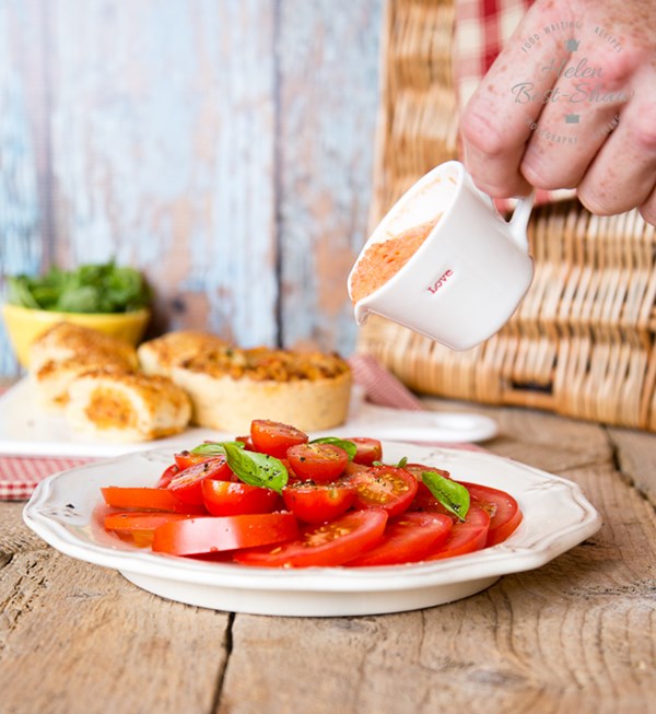 Three tomato salad with tomato salad dressing