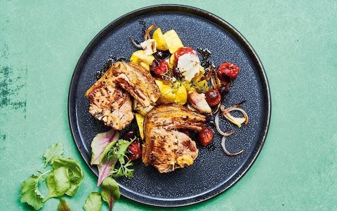 Thyme-roasted lamb chops  with potatoes, tomatoes, black olives and  goat’s cheese