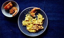 Tiger prawns with pork scratchings and thyme-braised chickpeas