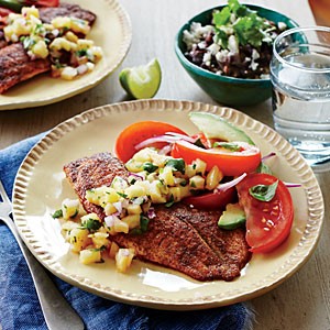 Tilapia with pineapple salsa and tomato-avocado salad