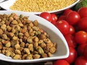 Tiny tomatoes with green olive sauce