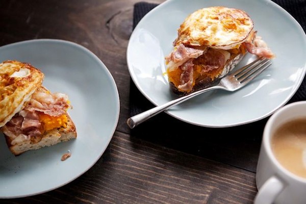 Toast with squash, prosciutto, and an egg