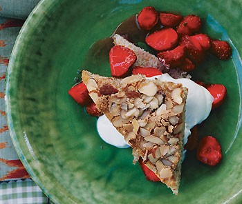 Toasted-almond cake with strawberries in rose-water syrup