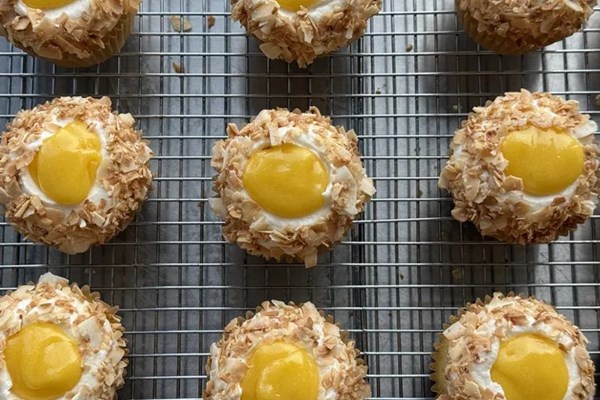 Toasted coconut cupcakes with passion fruit curd
