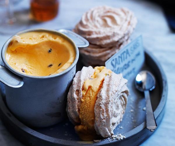 Toasted coconut meringue sandwiches with passionfruit ice cream