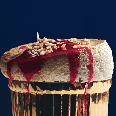 Toasted-coconut soufflés with ruby-red cranberry sauce