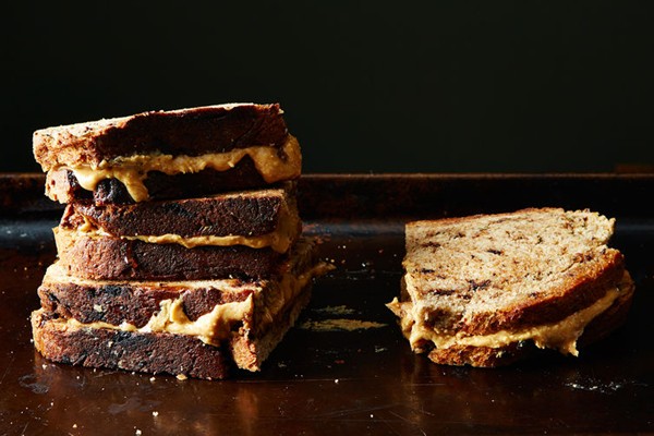 Toasted peanut butter and honey sandwich on rosemary chocolate bread