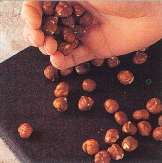 Toasting and skinning hazelnuts and Brazil nuts