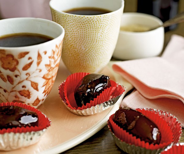 Toffee-dipped dates stuffed with almonds and chocolate