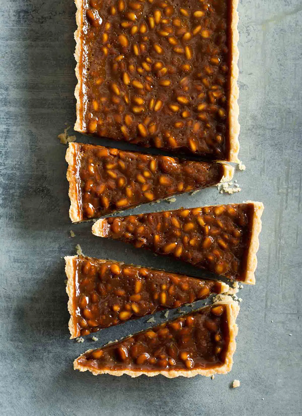 Toffee tart with pine nuts and rosemary
