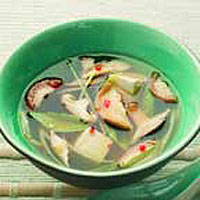 Tofu and mushrooms in a fragrant lemon grass broth